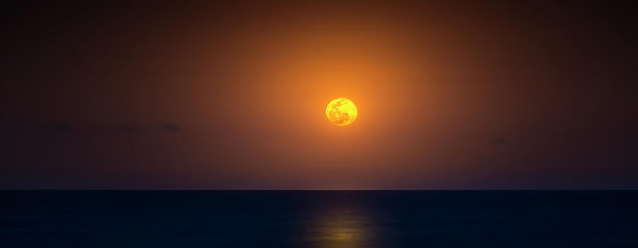Worm Moon Over the Sea Photograph by Mark Andrew Thomas