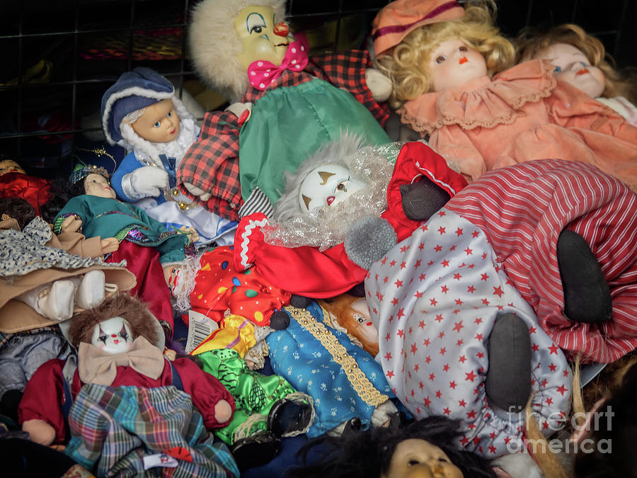 Worn out dolls puppets on a flea market in Rome, Italy Photograph by ...