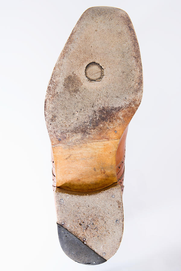 Worn sole of a shoe Photograph by Image Source