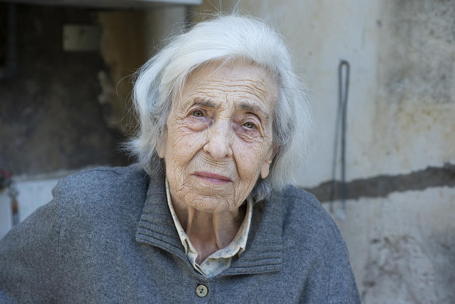 Worried senior woman Photograph by Francesco_de_napoli