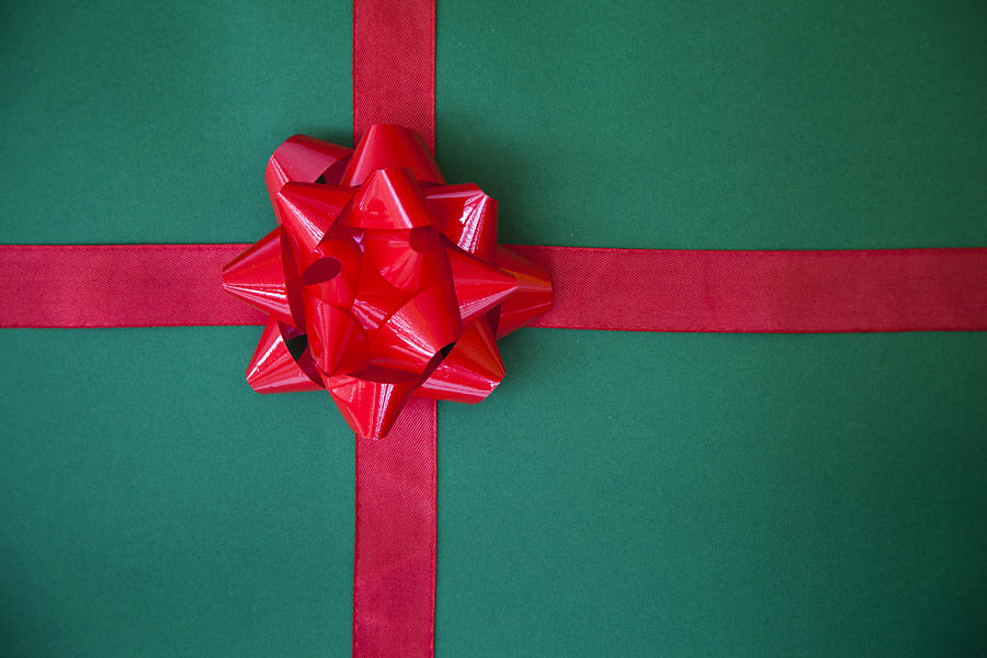 Wrapped Gift With A Red Bow Photograph by JamieB