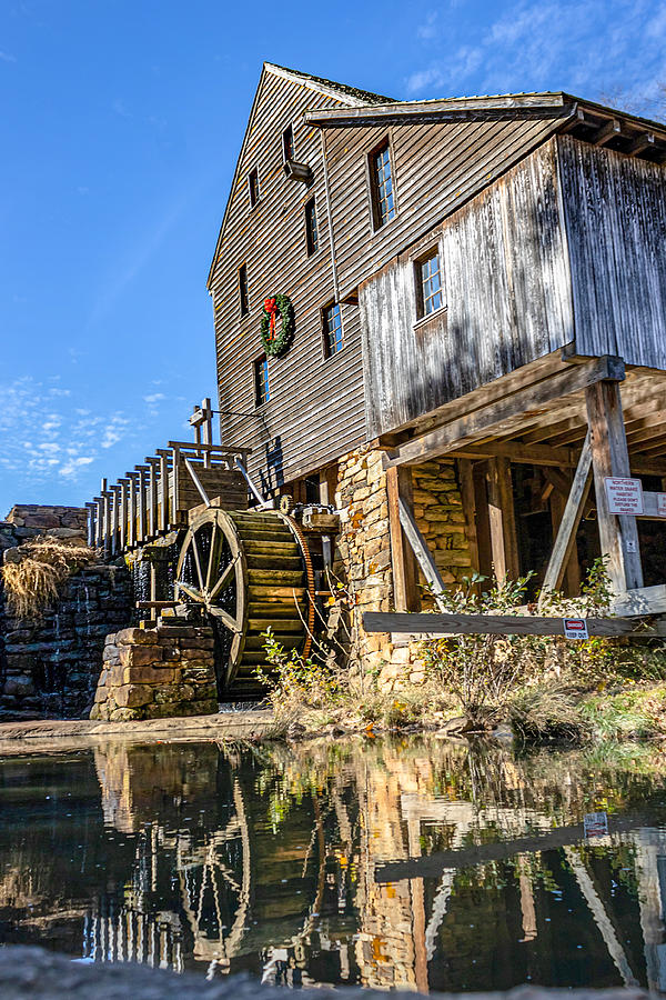 Wreath hung on the Mill Photograph by Rick Nelson