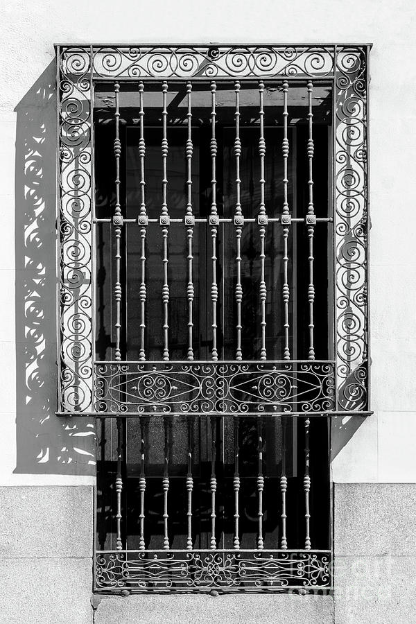 Wrought iron grille on a window in Madrid Photograph by Delphimages Photo Creations