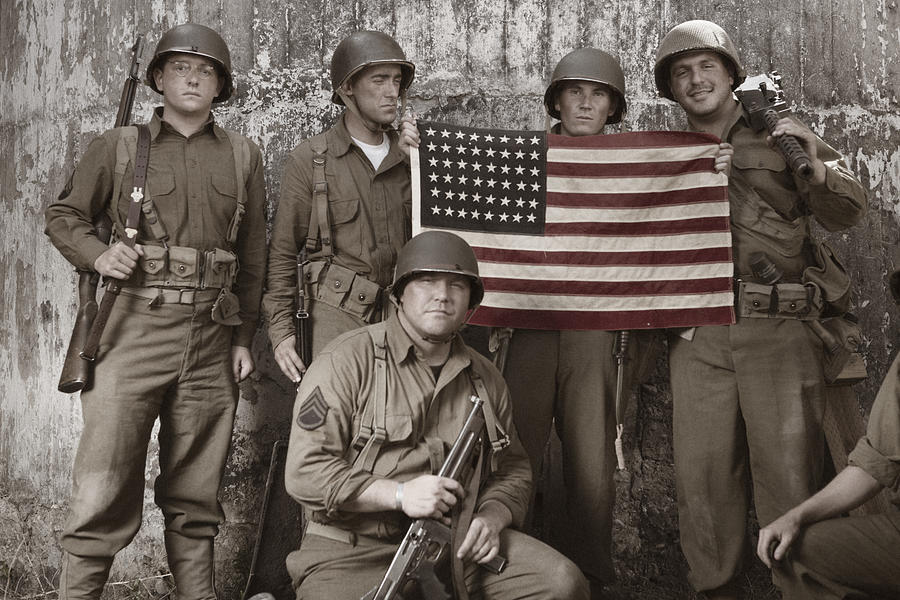 WW2 platoon holding American Flag Photograph by Inhauscreative