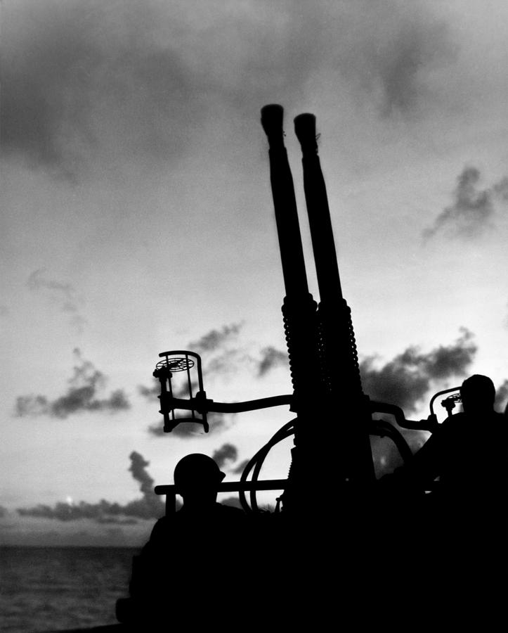 WWII Gunners Silhouette at Dusk Photograph by Historic Image