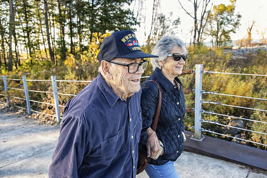 WWII USA Military War Veteran Father and Daughter Walking Photograph by Willowpix