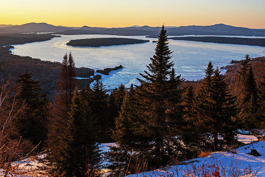 Sunset Photograph - Winter Snow over Rangeley Lake Rangeley Maine in the Winter Mooselookmeguntic Lake by Toby McGuire