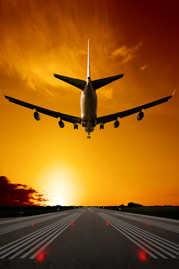 XXXL jumbo jet airplane landing at sunset Photograph by Sharply_done