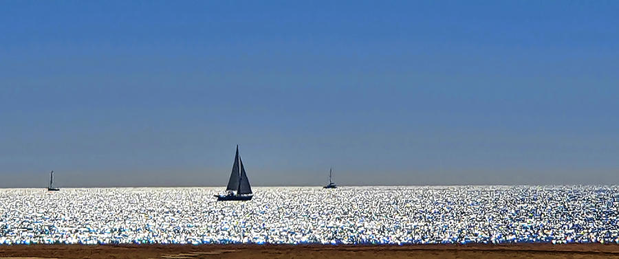 Yacht at Sea in Alvor Photograph by Jeremy Hayden