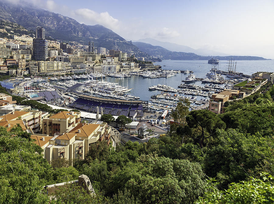 Yachts galore, splended Condominiums, georgous mountain and Marina views all surround the stands that are assembled annually for viewing the Grand Prix at Monaco Photograph by VisionsbyAtlee
