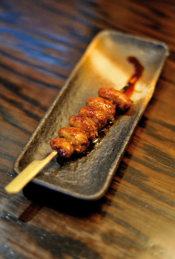Yakitori skewer of chicken hearts Photograph by Kelly Doong