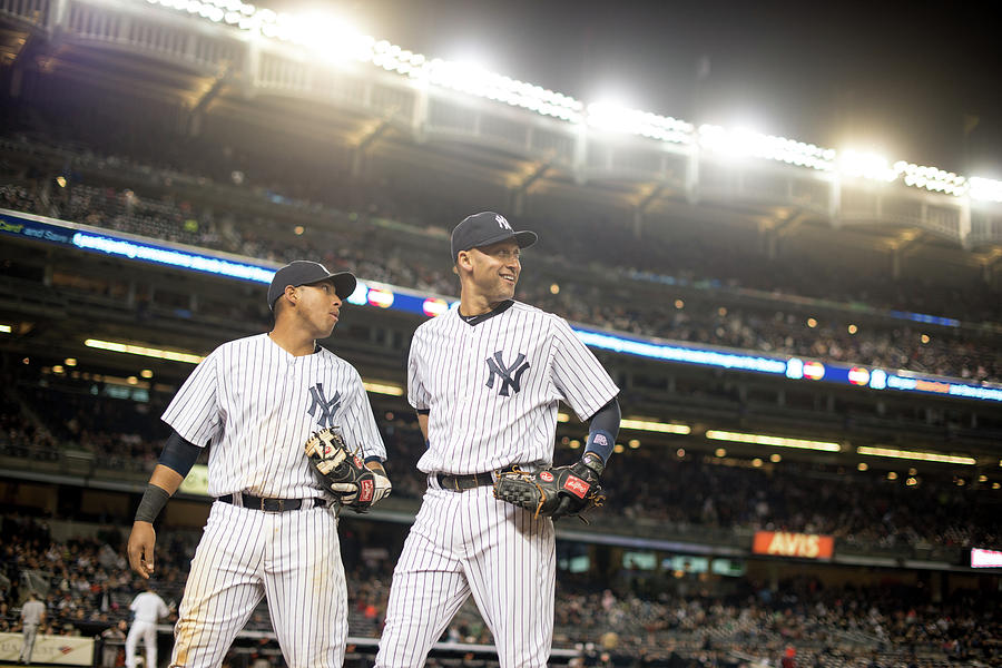 Yangervis Solarte and Derek Jeter Photograph by Rob Tringali Yangervis Solarte and Derek Jeter Photograph by Rob Tringali
