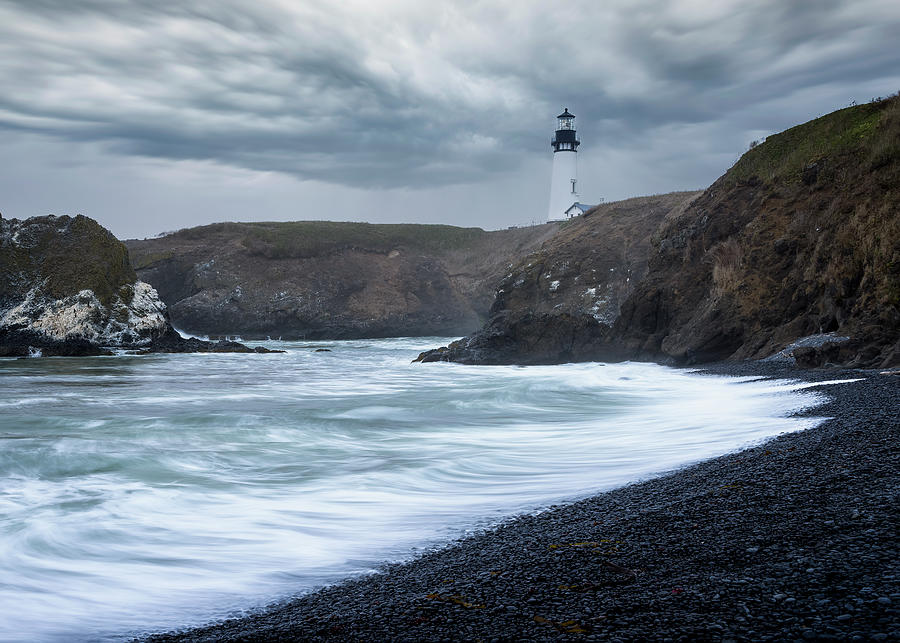Yaquina Head Lighthouse in Stormy Weather Photograph by Adam Romanowicz