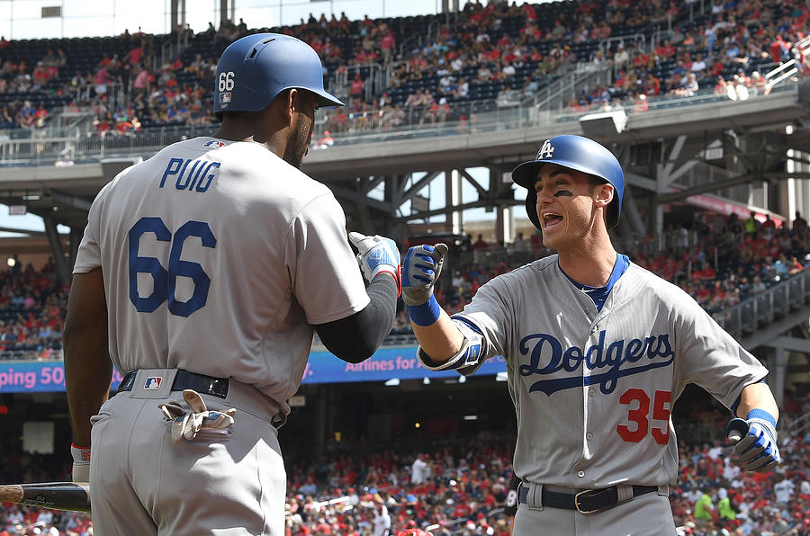Yasiel Puig and Cody Bellinger Photograph by Greg Fiume