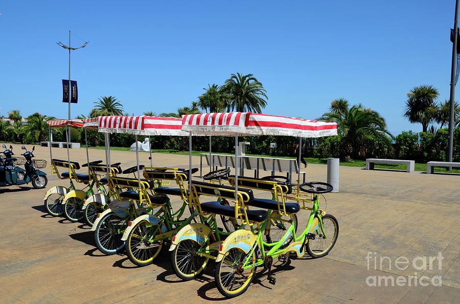 Yellow And Green Tandem Cycles For Rent At Black Sea Front By Tourists Batumi Georgia Photograph