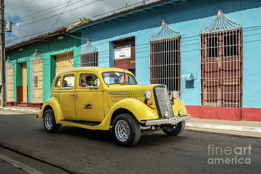 Yellow classic car in Trinidad Photograph by Karin Stein - Fine Art America