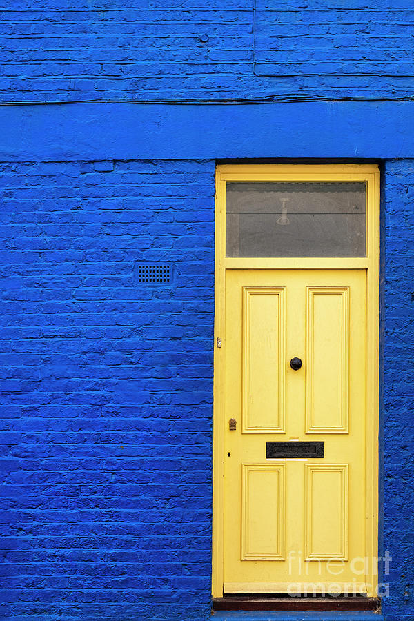 Yellow Door Blue House Photograph by Tim Gainey