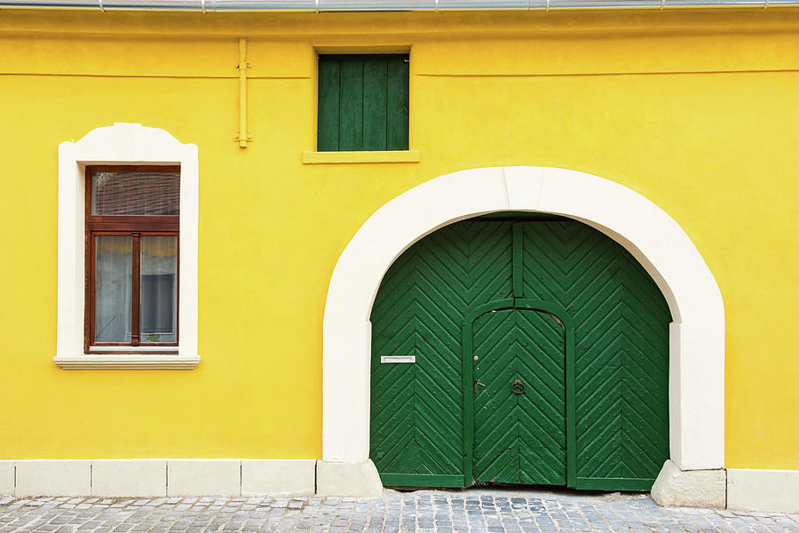 Yellow facade of old house Photograph by Viktor Wallon-Hars