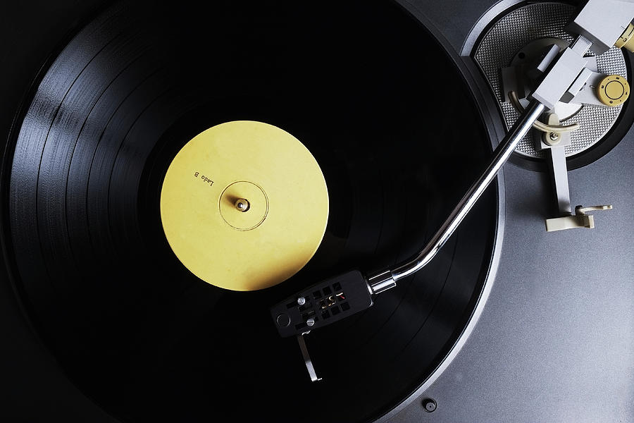 The Nostalgic Sounds of a Yellow Label Vinyl Record Photograph by Angelo DeVal