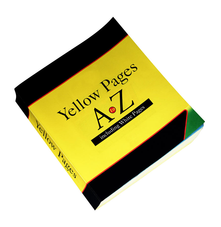 Yellow pages phone directory Photograph by Brand X Pictures