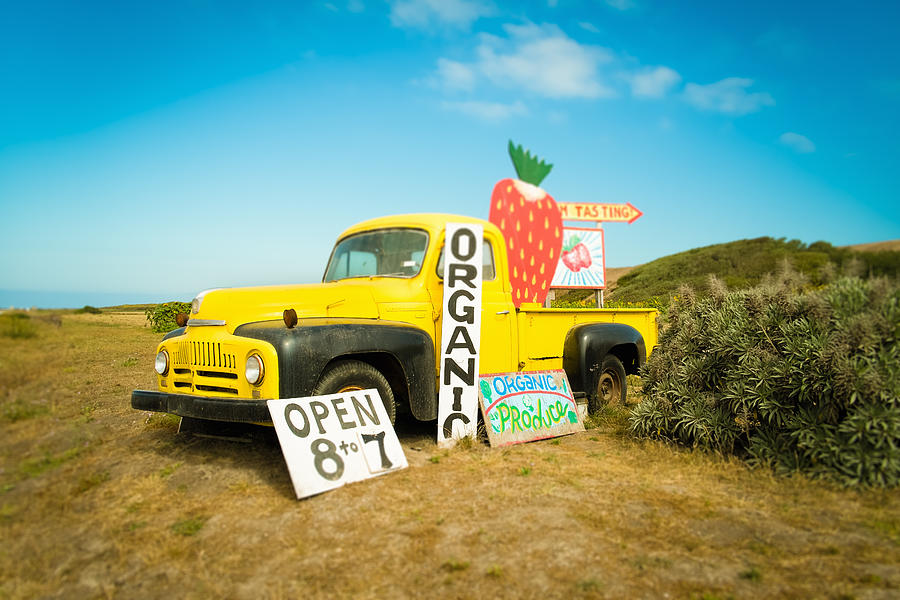 Yellow pickup truck and strawberry jam advertisement on roadside, Big Sur, Davenport, California, USA Photograph by Owen Smith