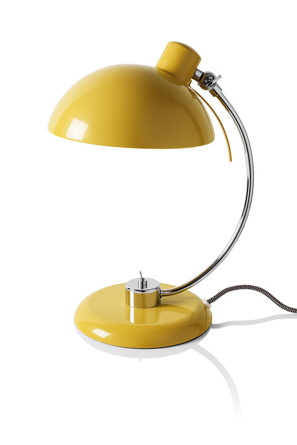 Yellow reading / desk lamp Photograph by Creative Crop