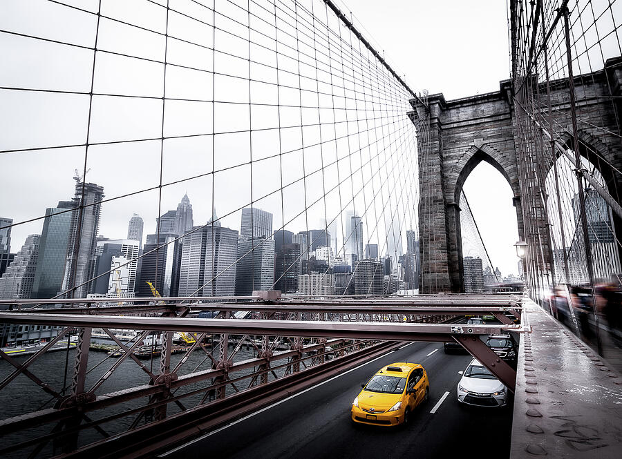 Brooklyn Bridge Photograph - Yellow Taxi over Brooklyn Bridge by Nicklas Gustafsson