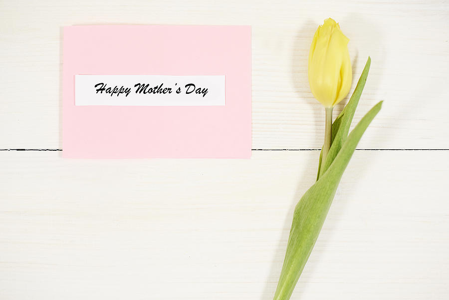 Yellow tulip next to Mothers Day card. Debica, Poland Photograph by Anna Bizon