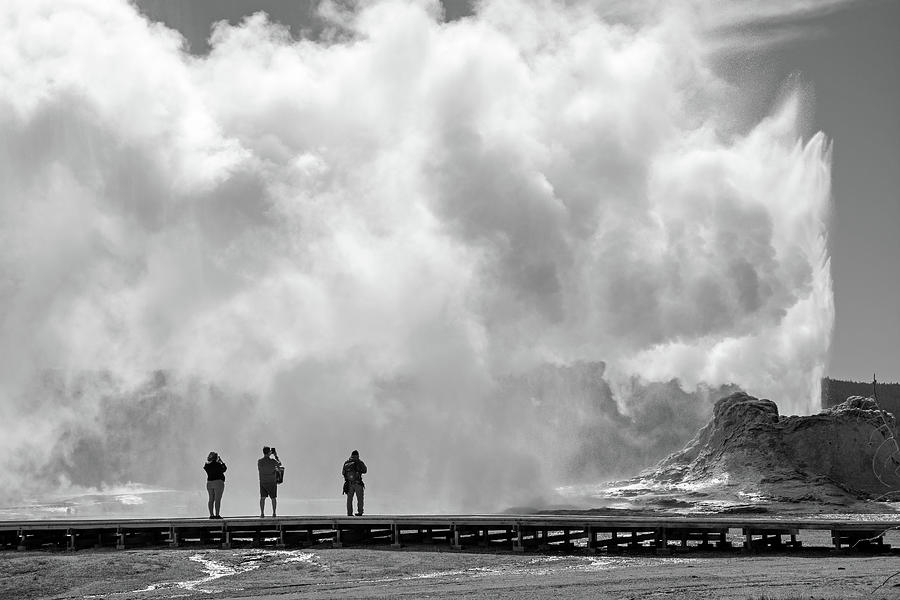 Yellowstones Castle Geyser Erupts in Black and White and Awes Visitors Photograph by Bruce Gourley