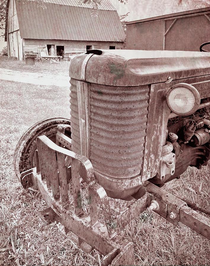 Yesterdays Tractor Front View in Sepia Photograph by Bill Swartwout