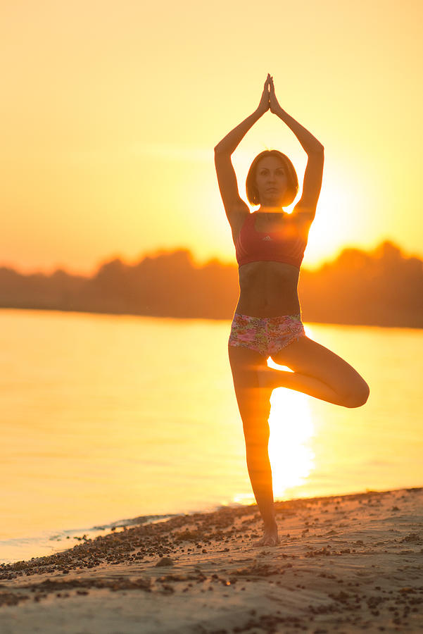 Yoga exercise (sunset beach) Photograph by Jane Khomi