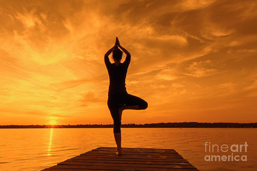 Yoga Tree Pose at Sunset Photograph by Arterra Picture Library