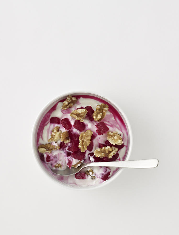 Yogurt and walnuts in a bowl Photograph by Mark Lund