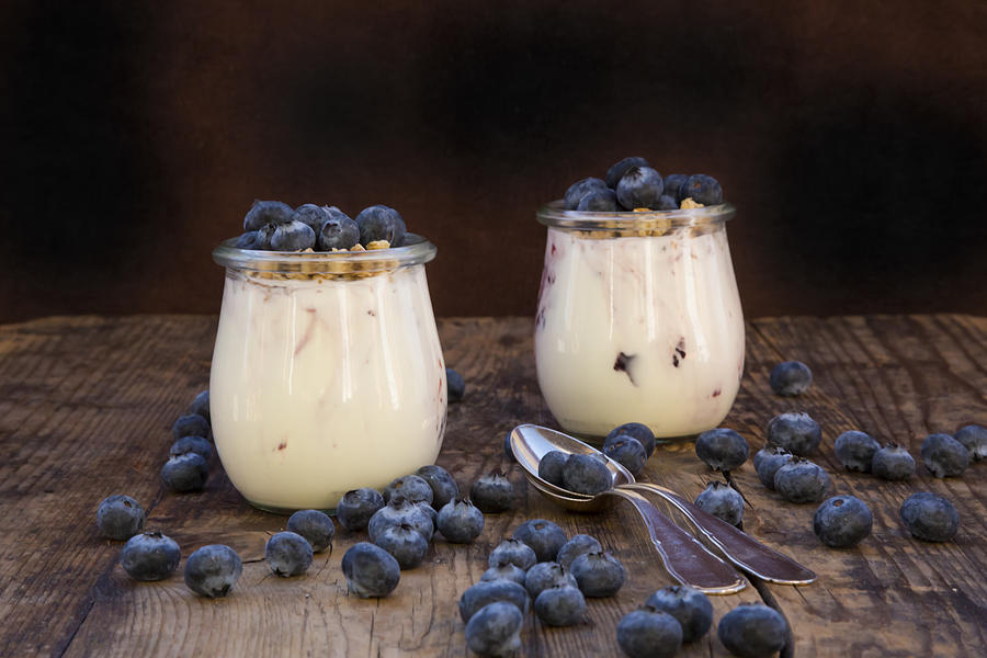 Yogurt with granola and blueberries Photograph by Larissa Veronesi