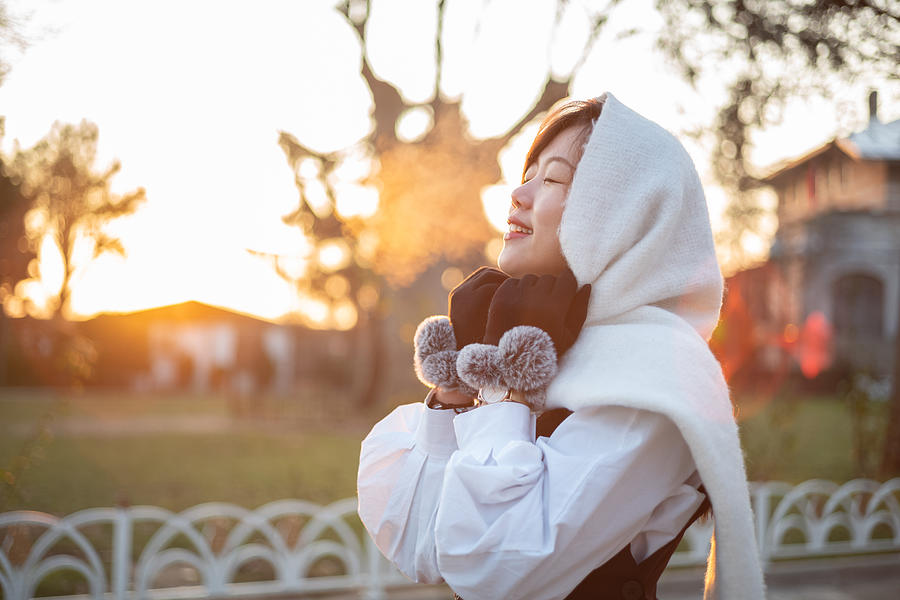 Young asian woman in cold weather country breath vapor Photograph by Hxyume