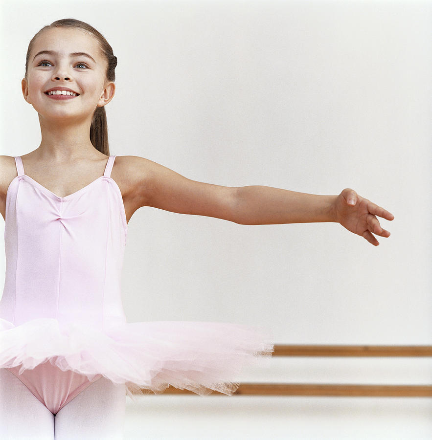 Young Ballet Dancer Practicing in a Dance Studio Photograph by Digital Vision.