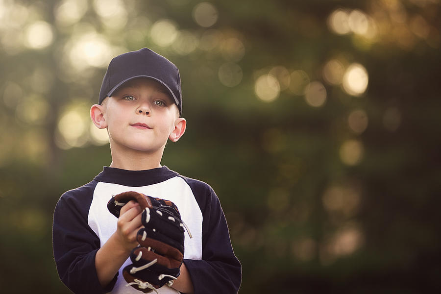 Young baseball player with glove Photograph by Rebecca Nelson