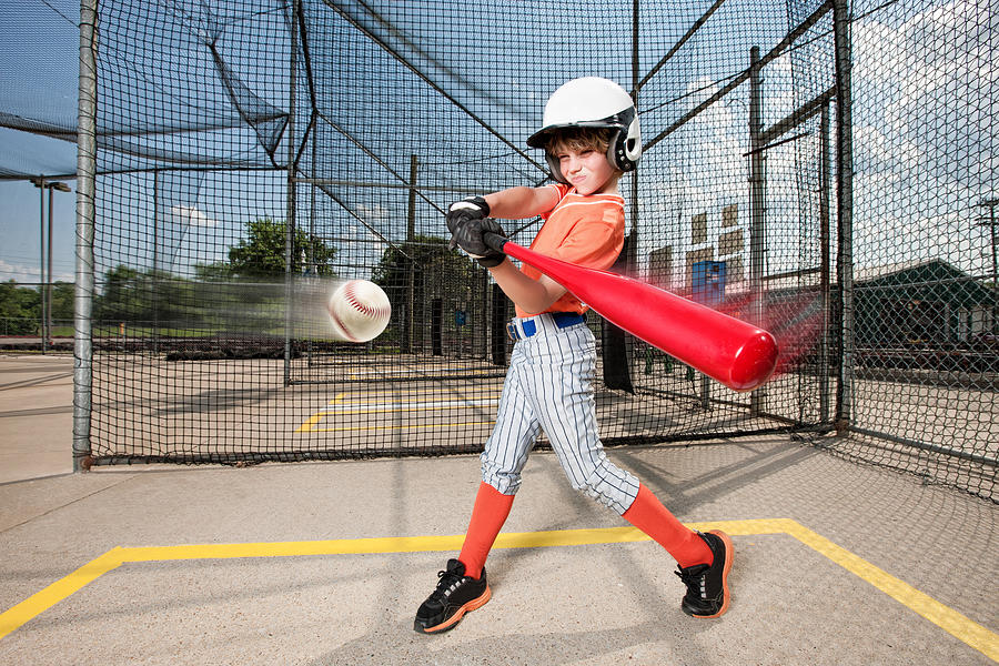Young Baseball Swing in Batting Cage Photograph by Avid_creative