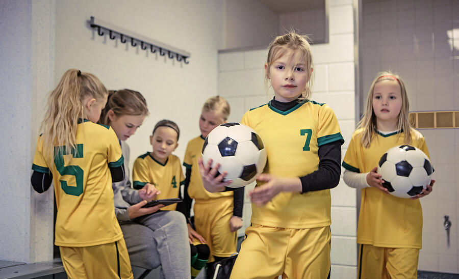 Young Blonde Female Soccer Player Girl during football training Photograph by Lorado