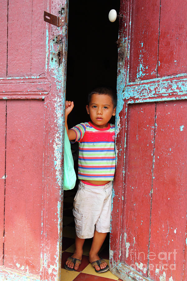 Young boy in doorway Panama Photograph by James Brunker