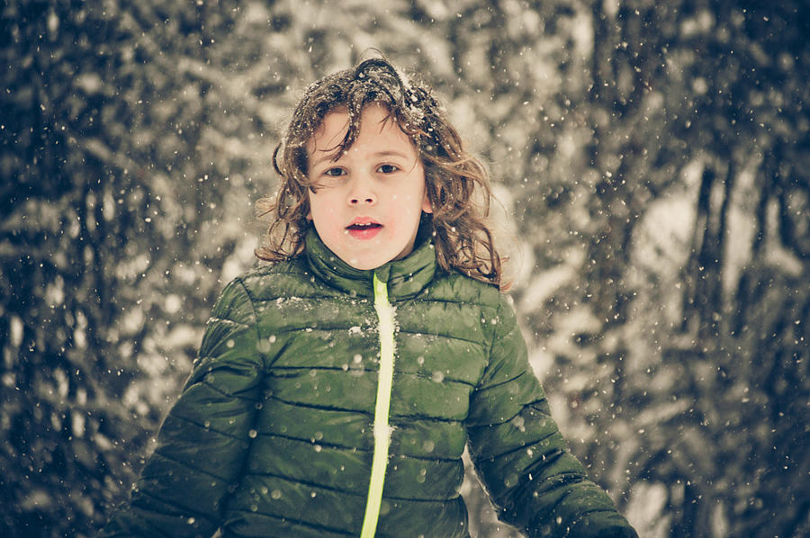 Young boy outside in the snow Photograph by Fran Polito