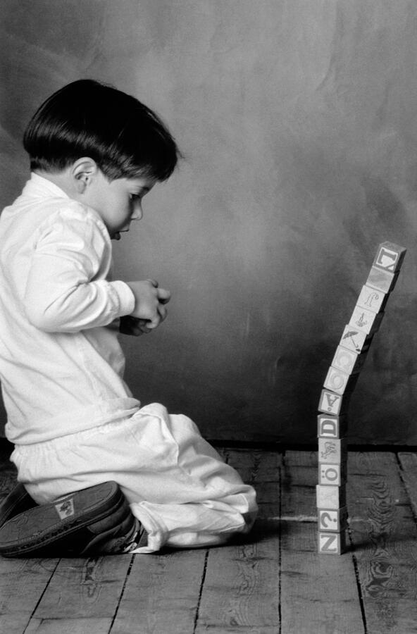 Young Boy With Stacked Blocks In Black And White Photograph by Per-Eric Berglund