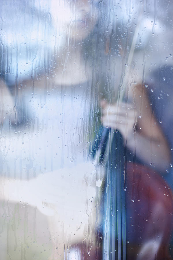 Young Cellist By A Rainy Window Photograph by Jenlinfieldphotography
