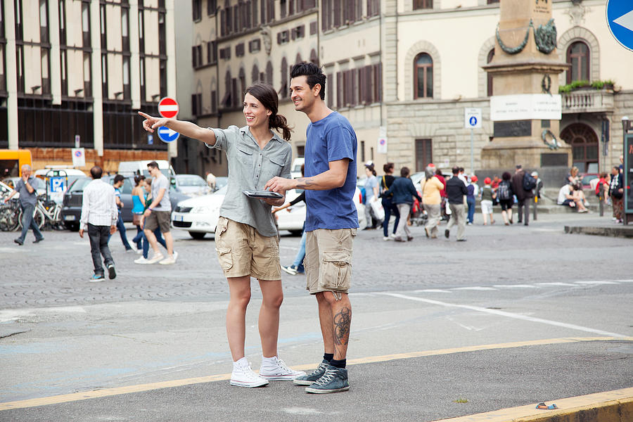 Young couple on city break, Florence, Tuscany, Italy Photograph by Innocenti