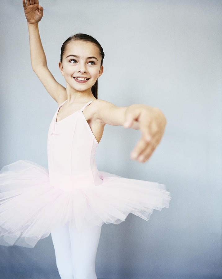 Young, Female Ballet Dancer Doing a Pirouette Photograph by Digital Vision.