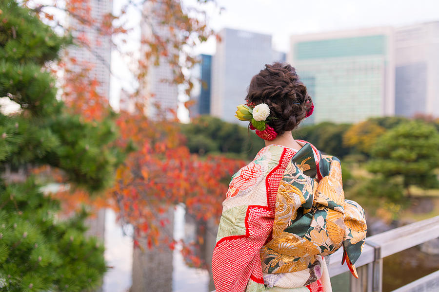 Young Furisode girl in autumn garden Photograph by Satoshi-K