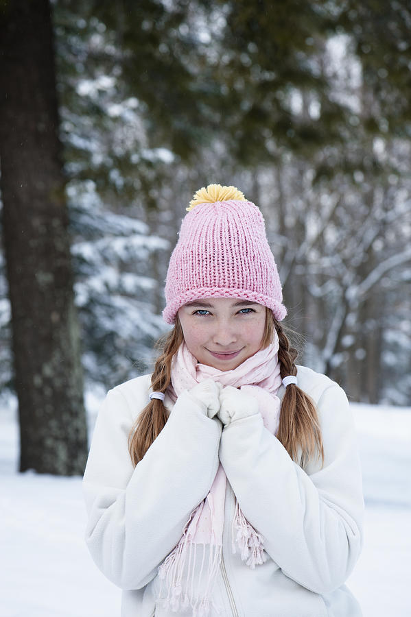 Young girl in snow. Photograph by Martinedoucet