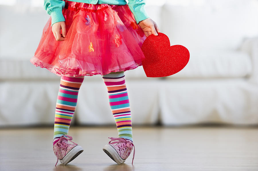 Young girl wearing colorful tights Photograph by Tetra Images - Daniel Grill