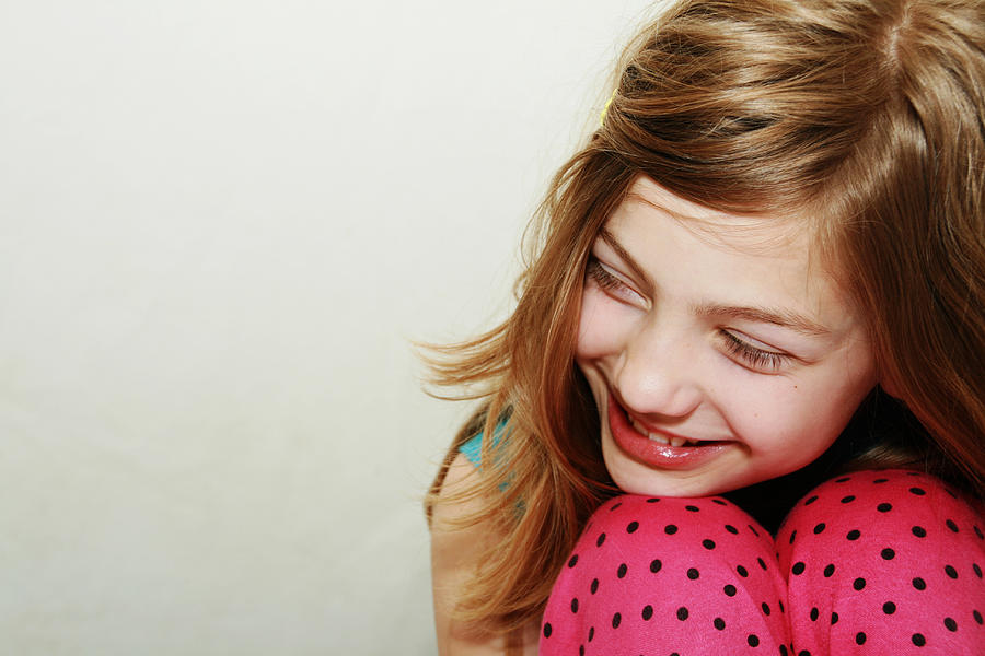 Young Girl Wearing Pink Polka Dotted Pants Smiling Photograph by Carasoyn