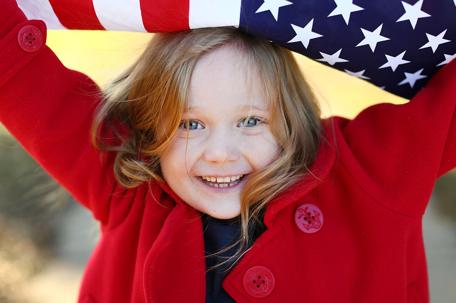 Young Girl With An American Flag Photograph by Marianna Massey